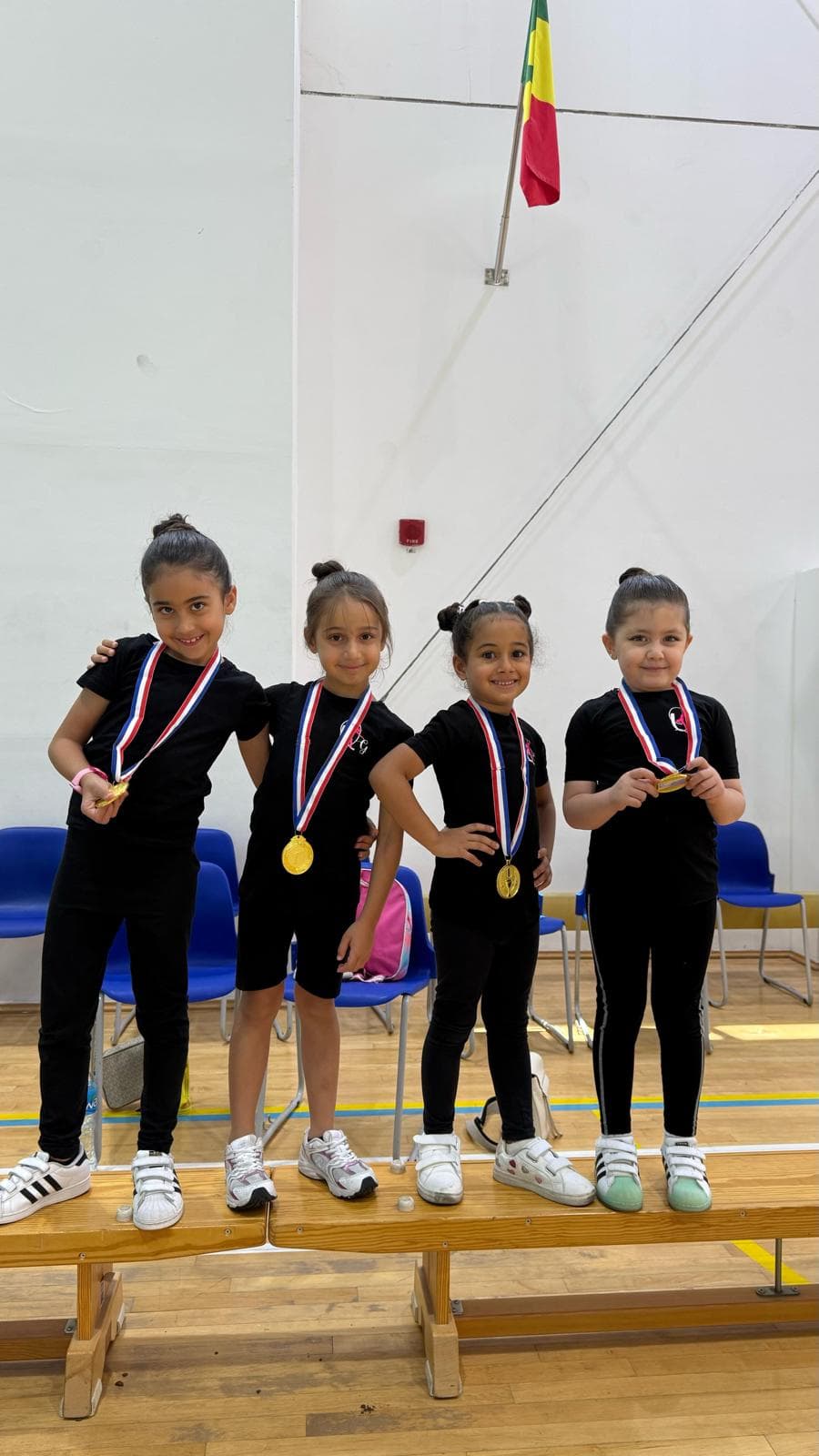 Young Queens gymnasts with medals