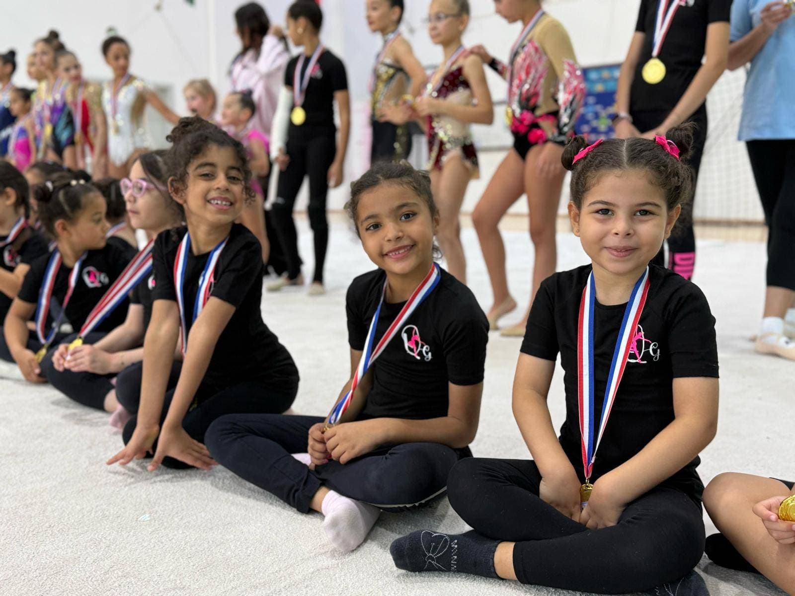 Rhythmic gymnast in graceful performance pose