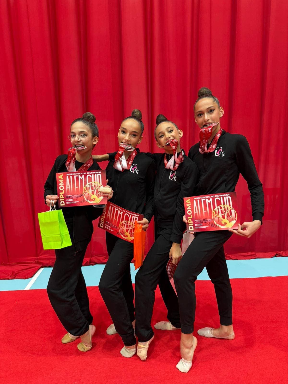 Queens Gymnastics team with diplomas at ALEM Cup international tournament